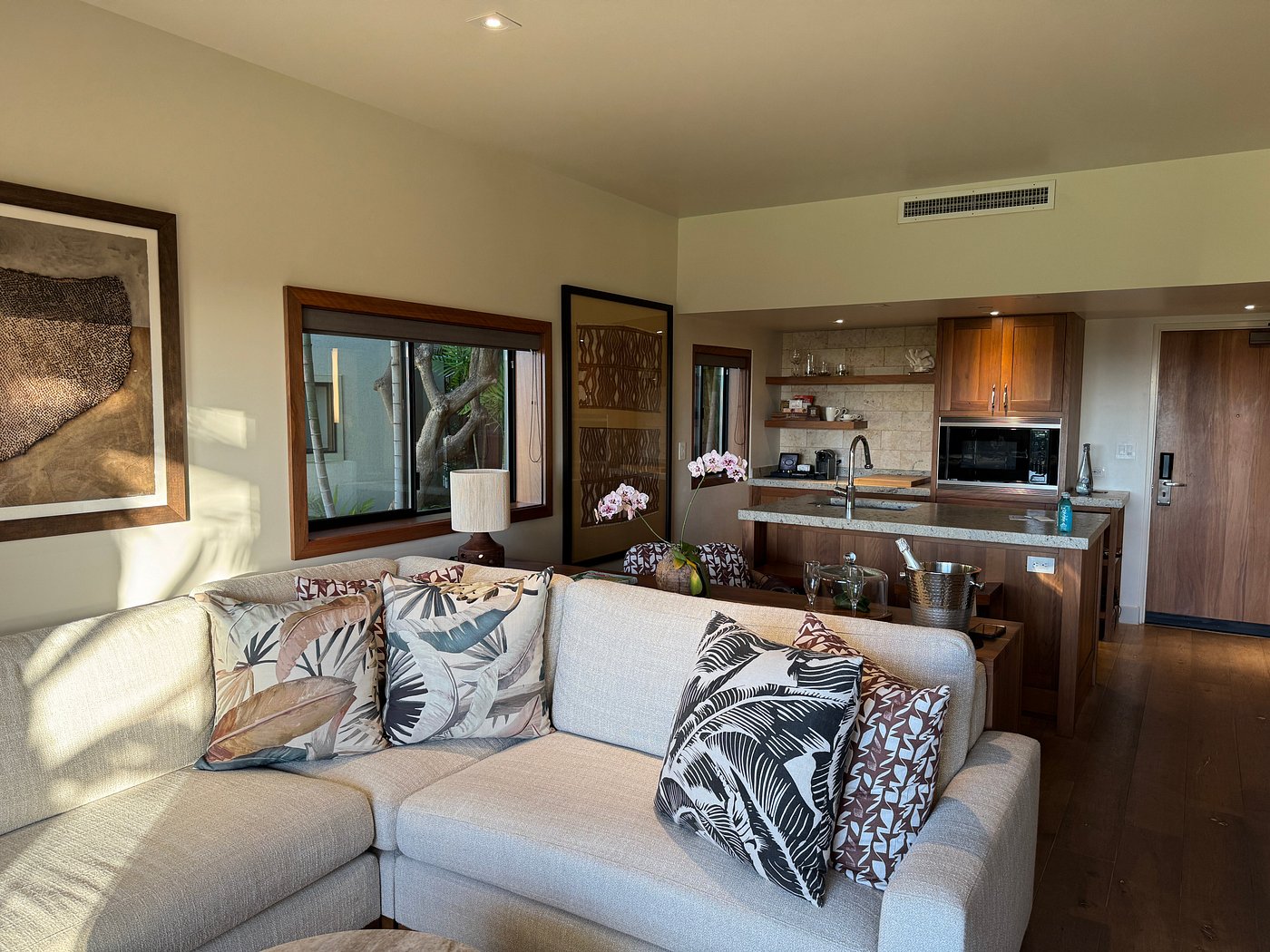 One-bedroom suite living room and kitchenette at Hotel Wailea