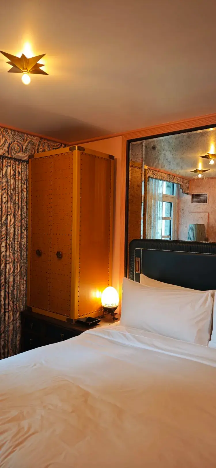 Guest bedroom at The Fifth Avenue Hotel